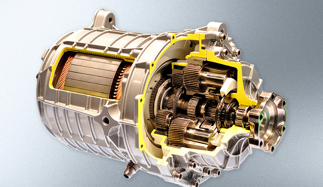 This image displays a cross-section of an electric motor, revealing copper coils, a rotor, stator, and gear components within a metal housing.